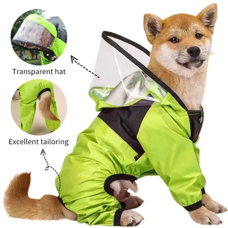 Small dog wearing a bright green waterproof jumpsuit with a transparent hood. The jumpsuit has tailored leg openings and full body coverage for rain protection